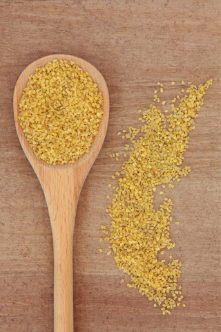 http://www.dreamstime.com/stock-image-bulgur-wheat-cereal-wooden-spoon-over-papyrus-background-image29922581